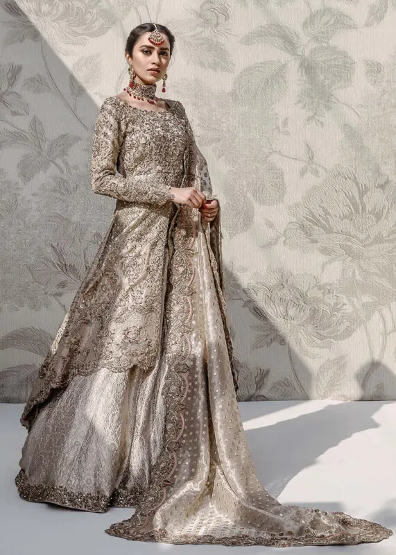 A soft silver-toned bridal dress, delicate yet dazzling — a perfect choice for your nikkah ceremony.